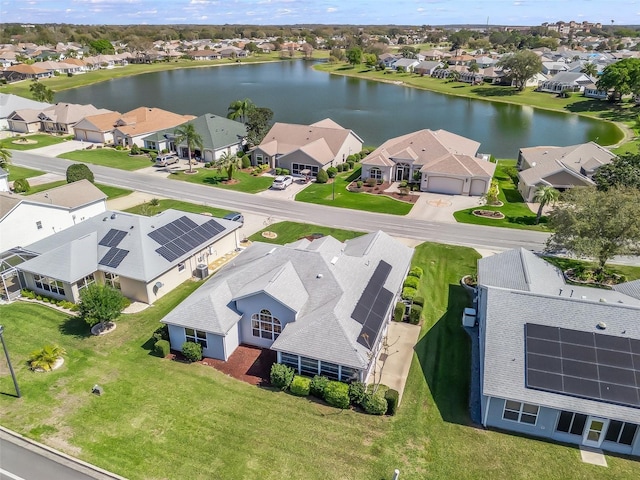 aerial view with a water view and a residential view