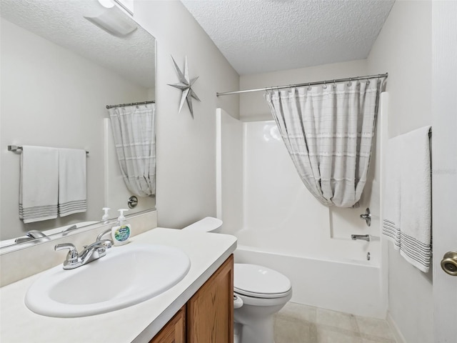 full bathroom featuring shower / bath combo, vanity, toilet, and a textured ceiling