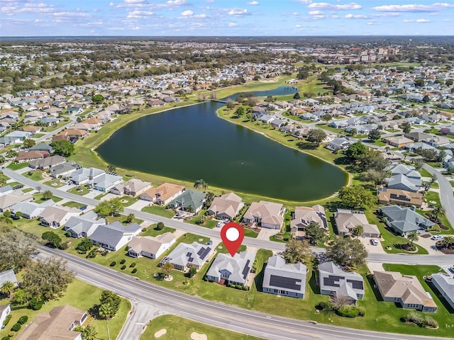 aerial view with a water view and a residential view