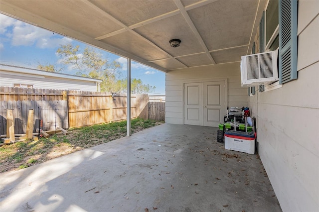 view of patio featuring fence