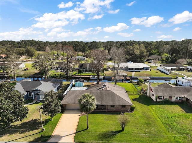 aerial view featuring a residential view and a water view