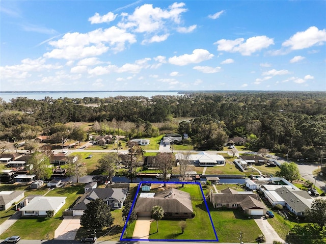 aerial view featuring a water view and a residential view