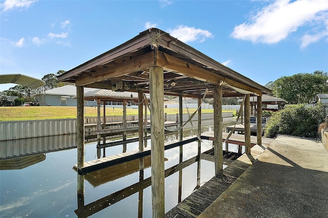 view of dock with a water view