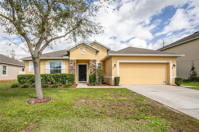 1841 Dunn Cove Dr, Apopka, FL 32703 - single story home featuring stucco siding, stone siding, driveway, a front yard, and a garage