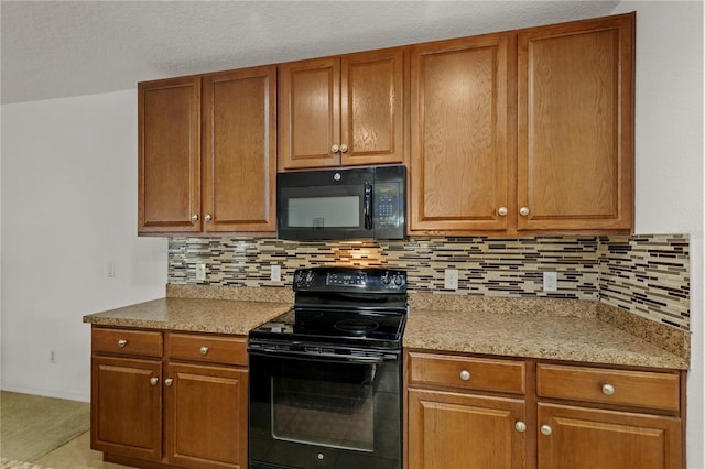 1841 Dunn Cove Dr, Apopka, FL 32703 - kitchen featuring backsplash, brown cabinetry, and black appliances
