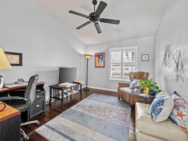 office space with lofted ceiling, dark wood finished floors, a ceiling fan, and baseboards