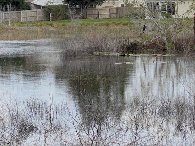 property view of water with fence