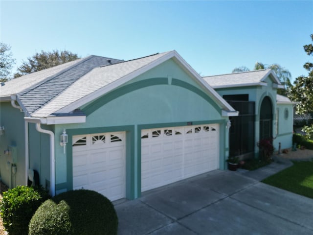 garage with driveway