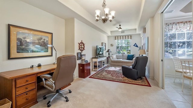 office area featuring baseboards, visible vents, a ceiling fan, light colored carpet, and light tile patterned flooring