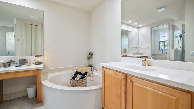 bathroom with visible vents, a sink, tile patterned flooring, a shower stall, and a bath