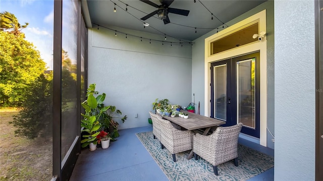 view of patio / terrace with a ceiling fan and outdoor dining space