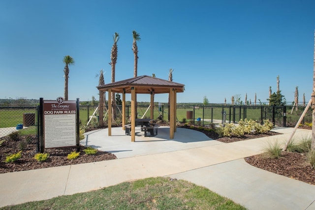 view of community featuring a gazebo and fence