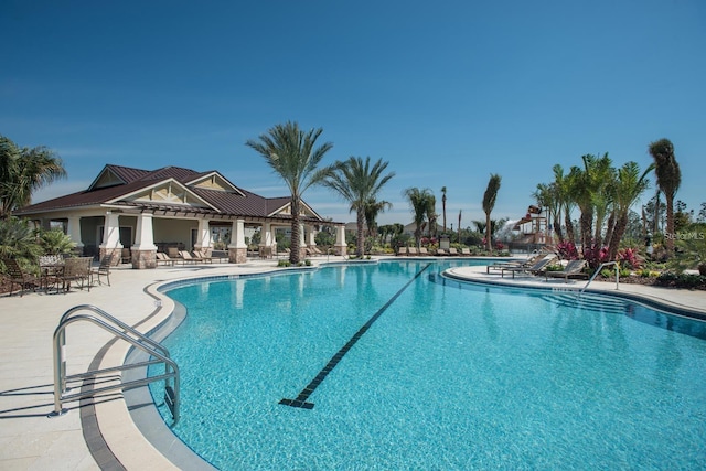 community pool with a patio