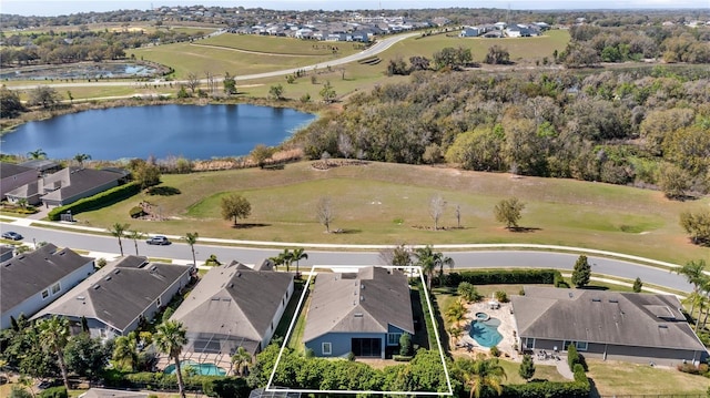 birds eye view of property featuring a residential view and a water view