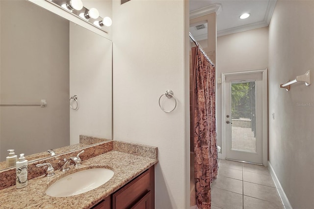 full bath featuring baseboards, tile patterned flooring, crown molding, vanity, and recessed lighting