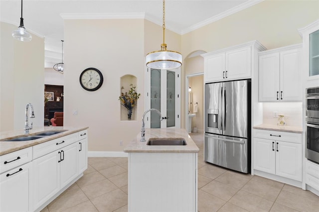 kitchen with light tile patterned flooring, crown molding, stainless steel refrigerator with ice dispenser, and a sink