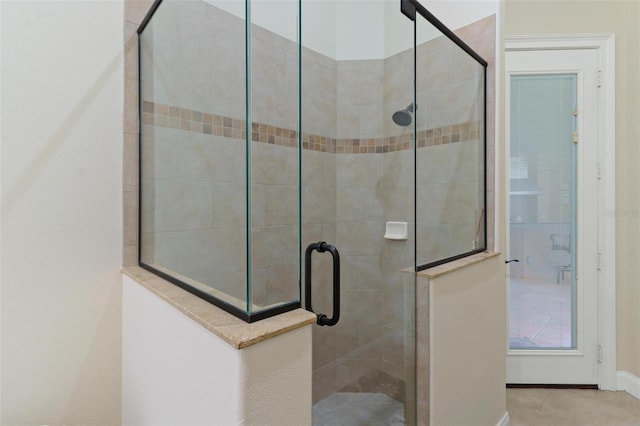 bathroom featuring a stall shower