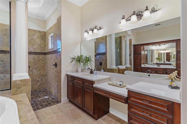 bathroom with a walk in shower, crown molding, decorative columns, a bathing tub, and vanity