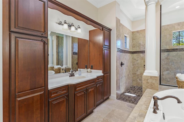 bathroom with walk in shower, a garden tub, ornamental molding, vanity, and ornate columns