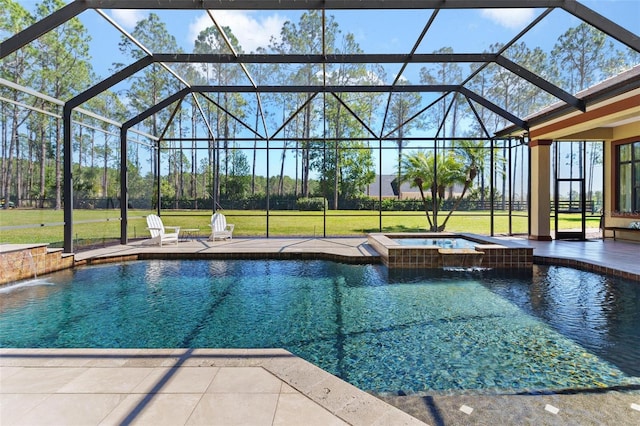 view of swimming pool featuring a lawn, a pool with connected hot tub, and a patio area