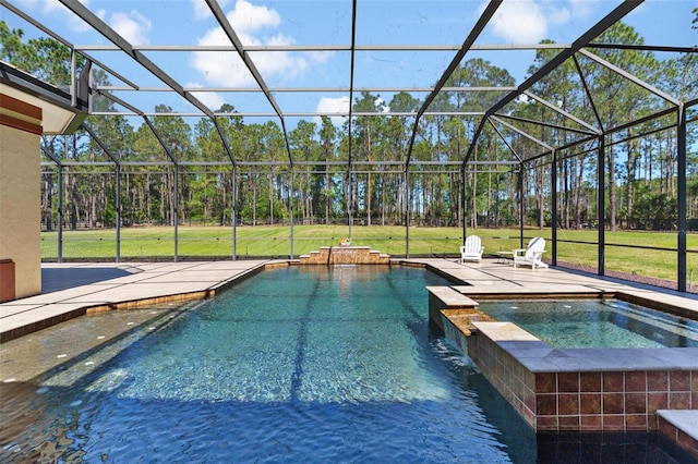 view of pool featuring a lanai, a lawn, a pool with connected hot tub, and a patio