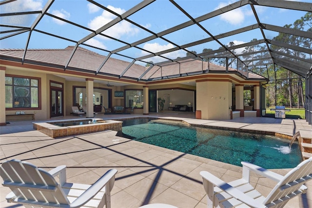 view of swimming pool with a pool with connected hot tub, ceiling fan, a lanai, a patio area, and a grill