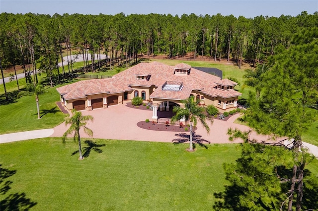 aerial view featuring a view of trees