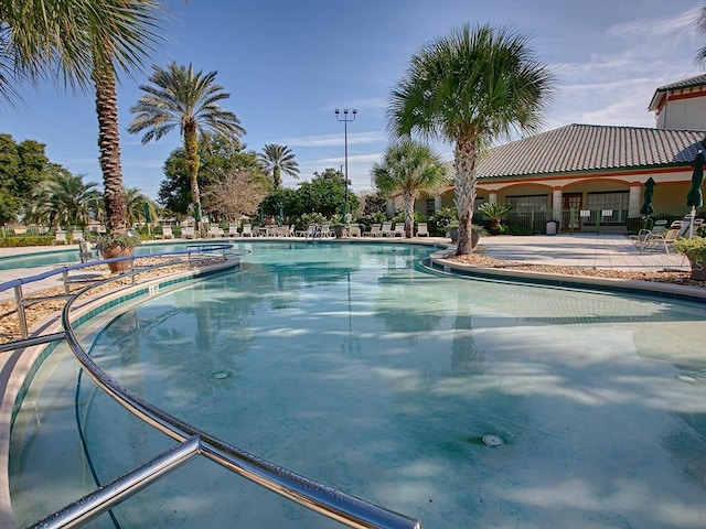 pool with a patio