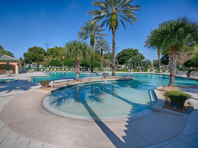 community pool featuring a patio