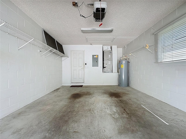 garage featuring concrete block wall, electric panel, a garage door opener, heating unit, and water heater