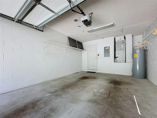 garage featuring concrete block wall, electric panel, a garage door opener, heating unit, and water heater