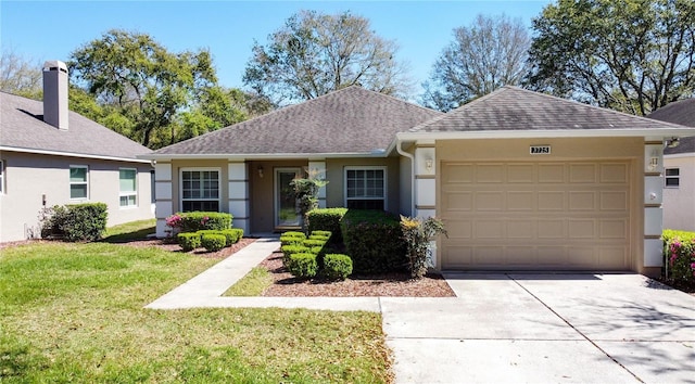 single story home featuring a front lawn, an attached garage, and stucco siding