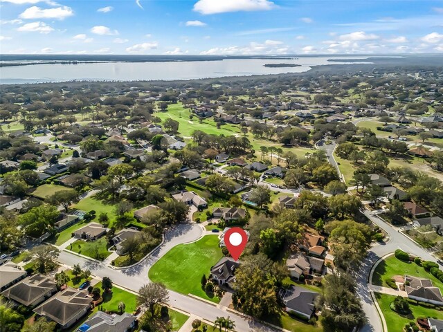 aerial view featuring a water view and a residential view