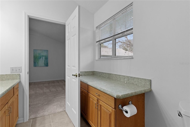 bathroom featuring tile patterned floors and vanity