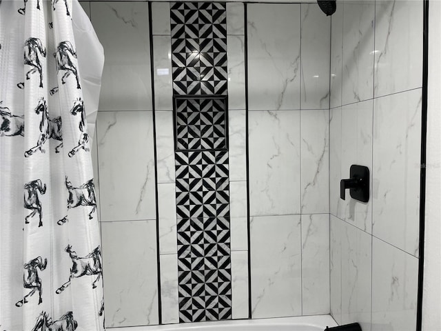 bathroom with tiled shower