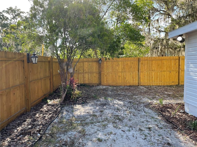 view of yard with fence