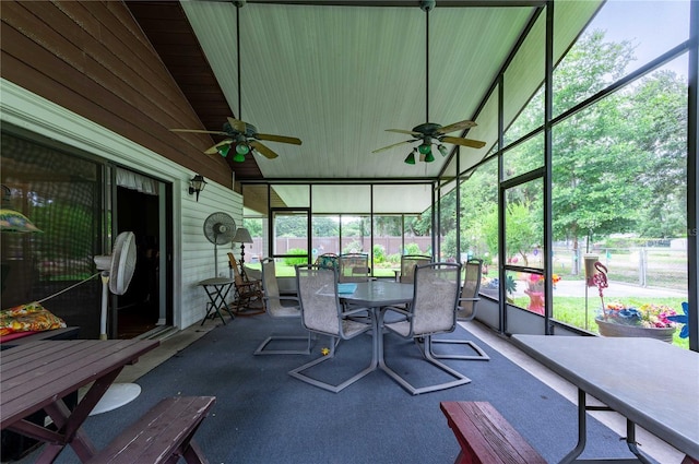 sunroom with a ceiling fan