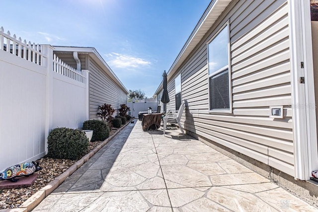 view of patio / terrace with fence