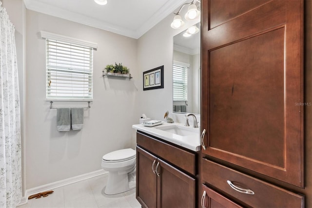 bathroom featuring toilet, ornamental molding, vanity, baseboards, and tile patterned floors