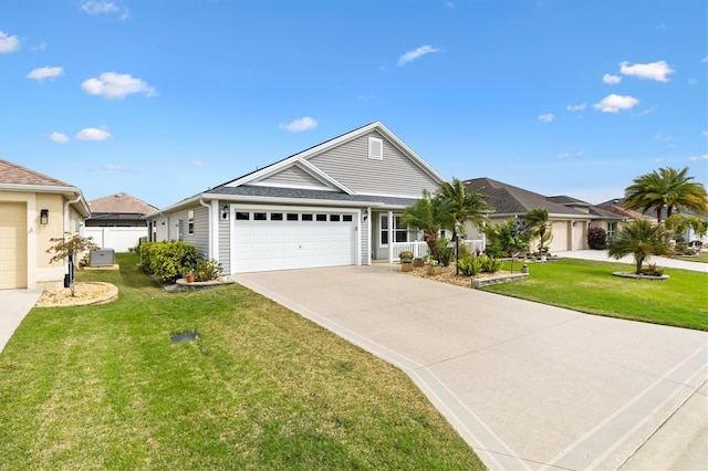 ranch-style house with driveway, a garage, and a front yard