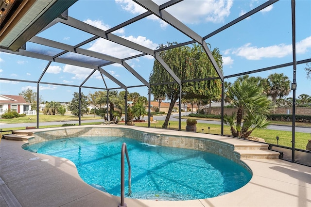 pool with a yard, a lanai, and a patio area