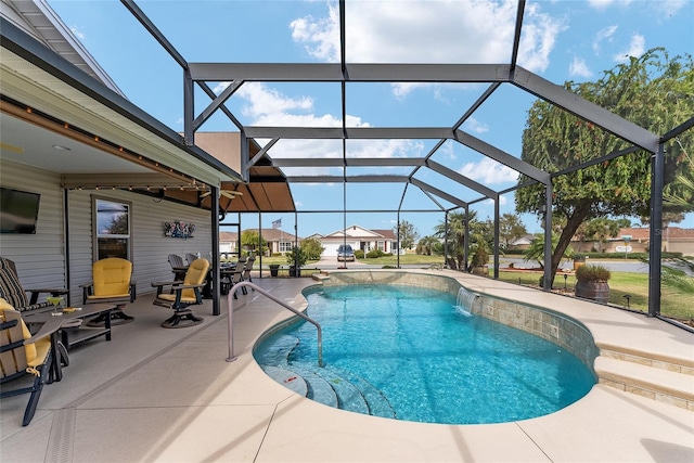 outdoor pool featuring a patio and a lanai