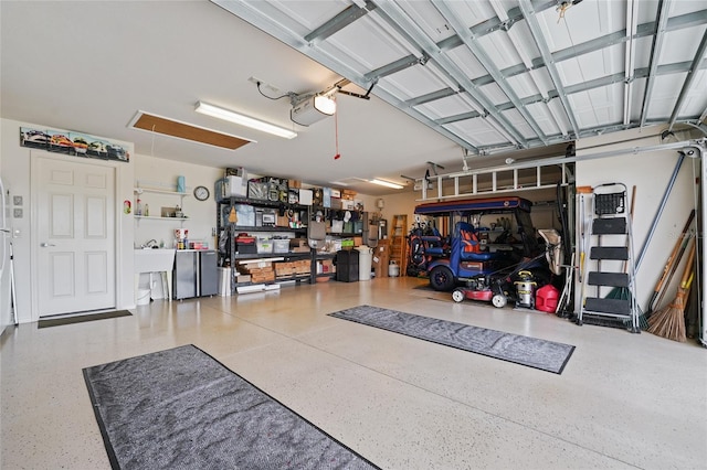 garage featuring a garage door opener