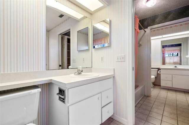 full bath featuring wallpapered walls, visible vents, toilet, vanity, and shower / washtub combination