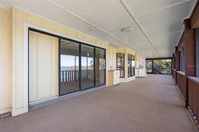 view of patio / terrace featuring a water view