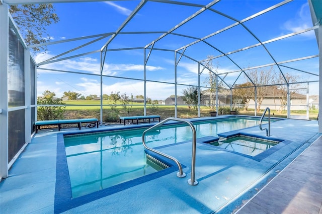 pool featuring a patio, a lanai, and a hot tub