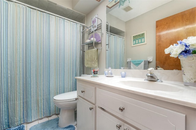 full bathroom with visible vents, vanity, toilet, and tile patterned floors