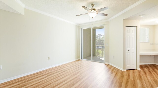 empty room featuring light wood finished floors, crown molding, ceiling fan, baseboards, and a textured ceiling