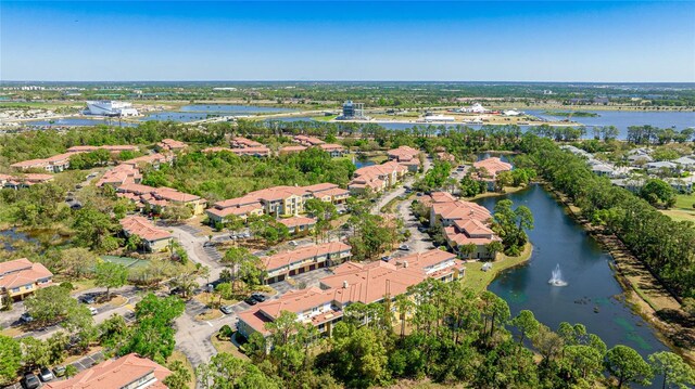 aerial view with a residential view and a water view