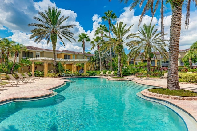 community pool featuring a patio and a pergola